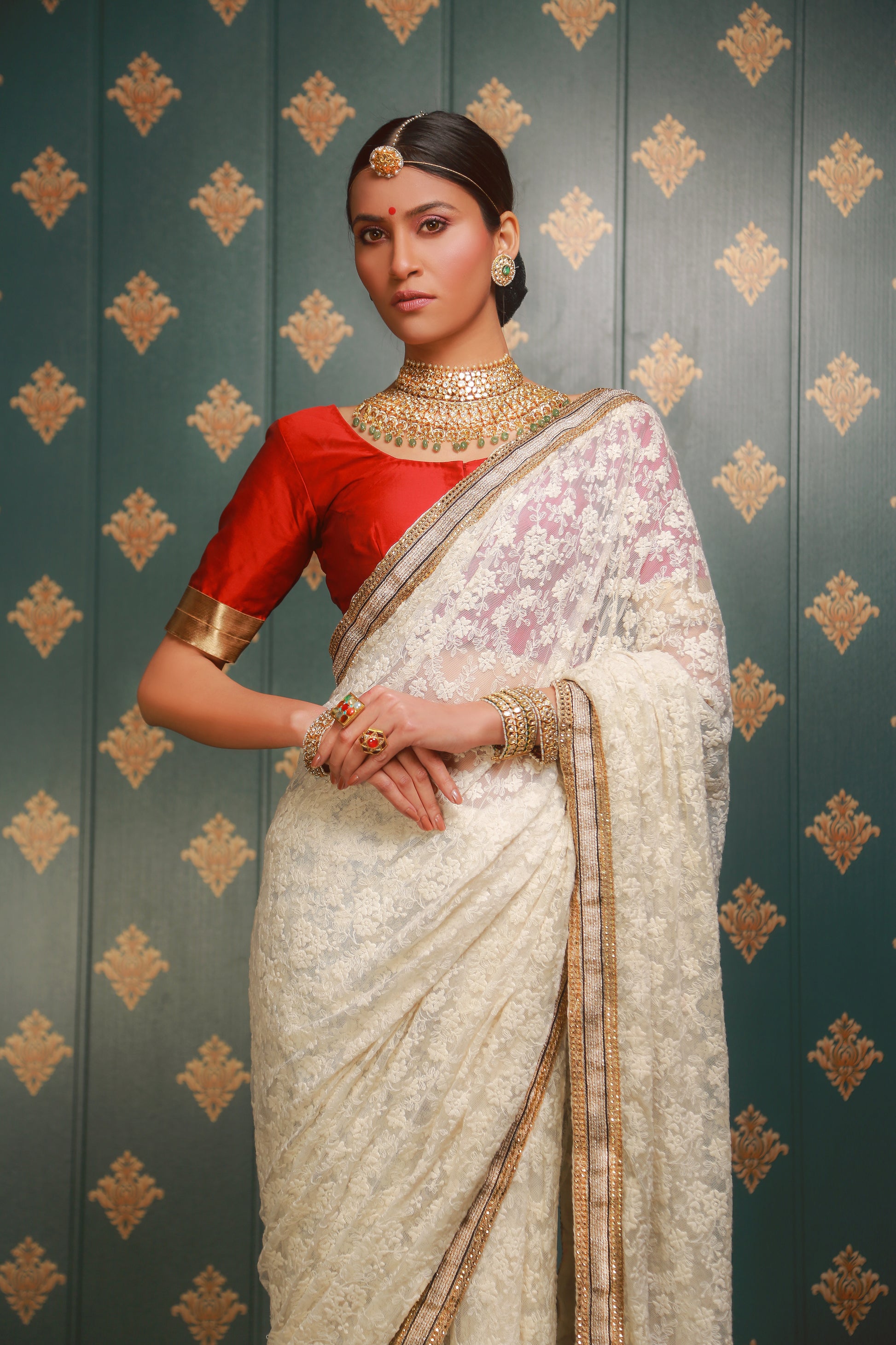 Ivory Lace Saree with Red Silk Blouse
